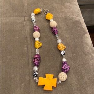 Purple, gold, stripe beaded necklace